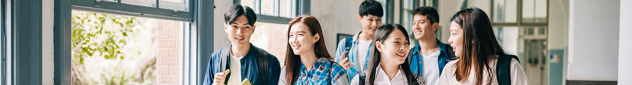 Students walking in school hallway